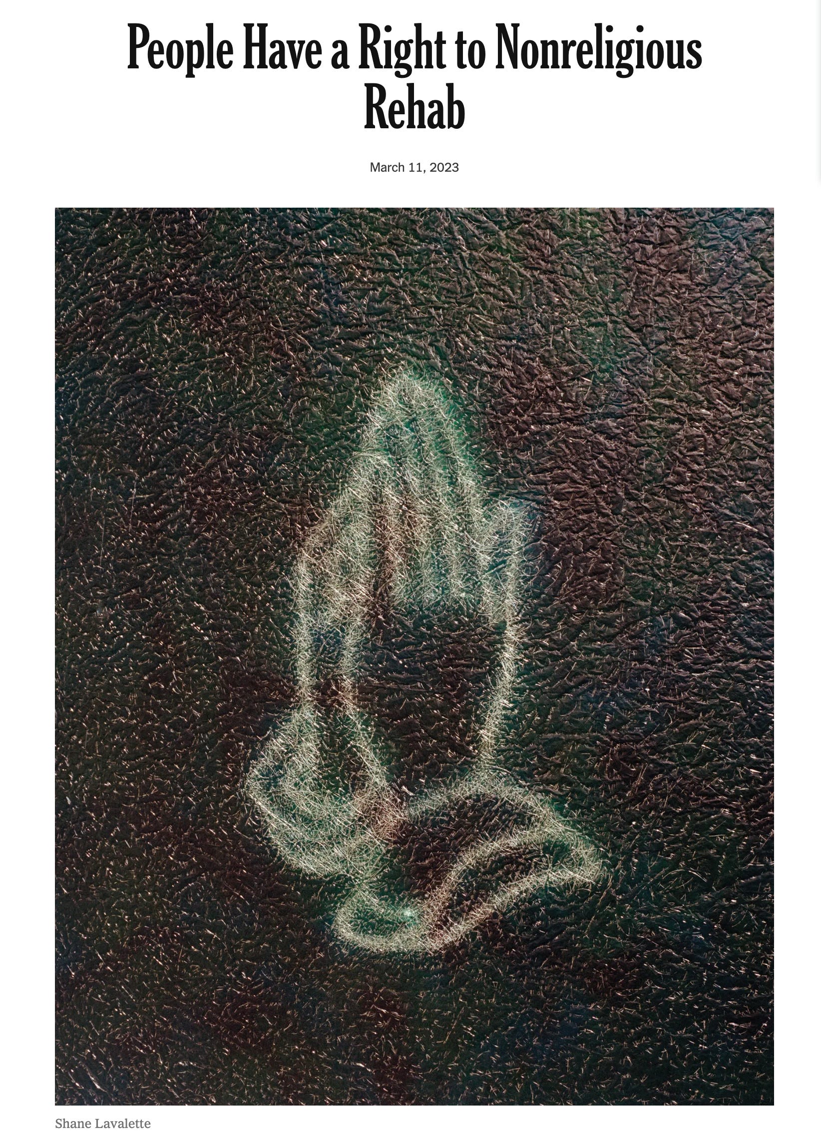 New York Times article titled "People have a right to non-religious rehab", with an image of praying hands in chalk on a black background, hands illuminated in the colour